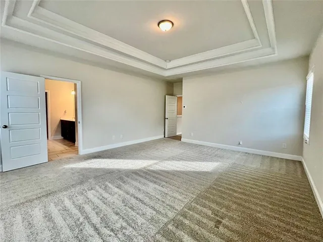 an empty room with a natural light