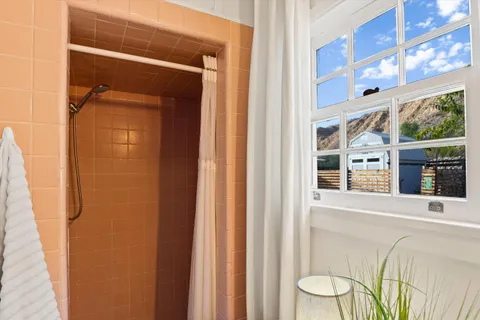 a view of bedroom with window