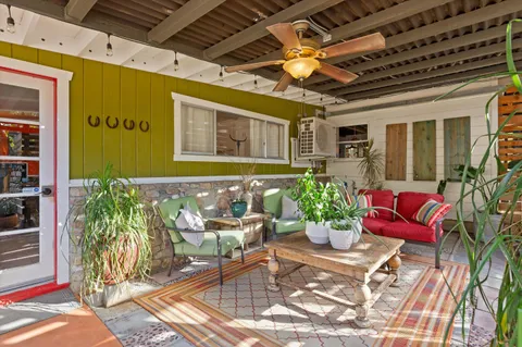 a view of an chairs and floor in the balcony