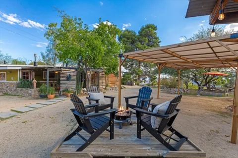 a view of a chairs and tables in patio