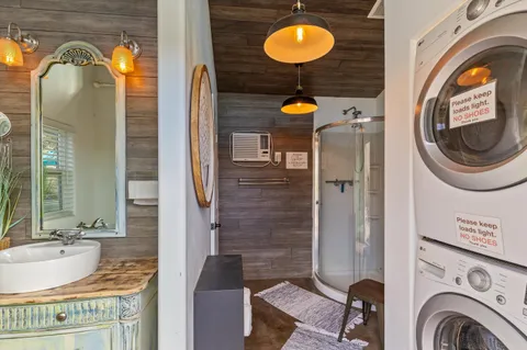 a view of a chairs and table in patio