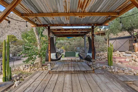a backyard of a house with seating space
