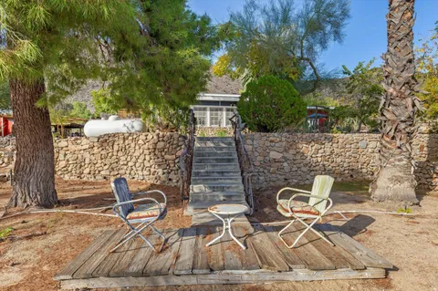 a view of a street with sitting area