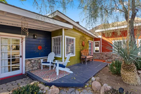 a view of yard with patio