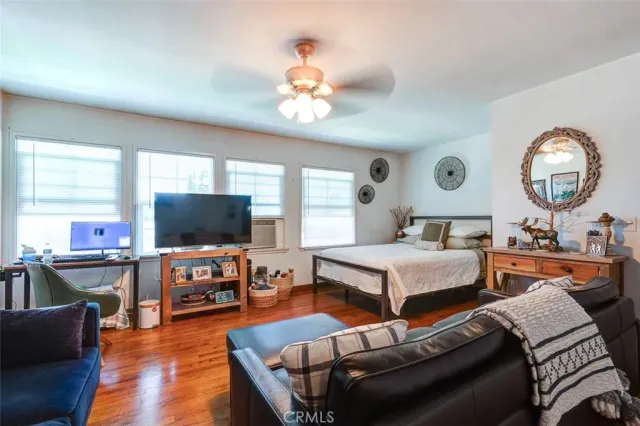 a view of room with window and hardwood