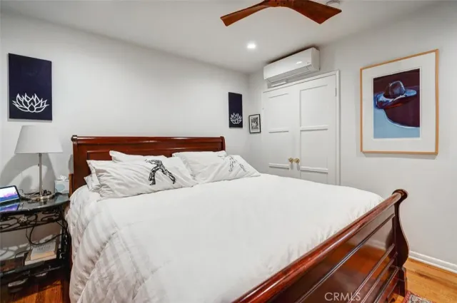 a bathroom with a sink a mirror and shower