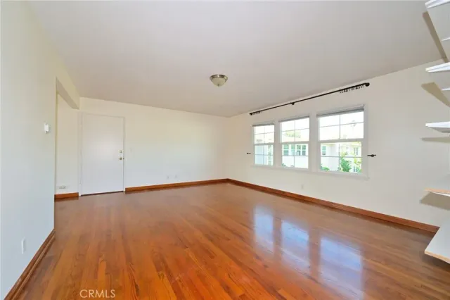 a bathroom with a sink a window and a mirror