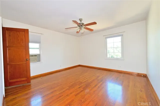 a kitchen with cabinets a window and a sink