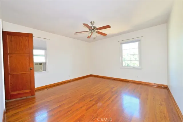 a view of a bathroom from the hallway