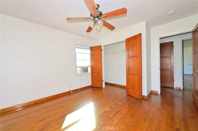 a room with window and pool