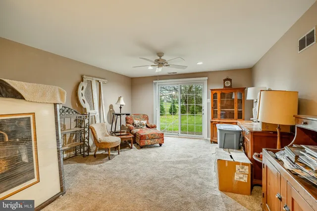 a view of a livingroom with furniture and a couch