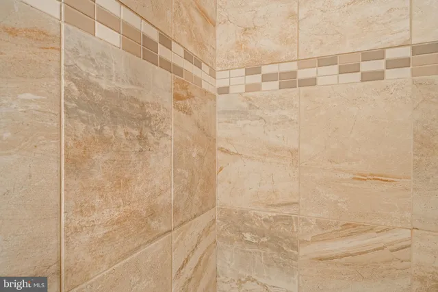 a view of storage and utility room with washer and dryer