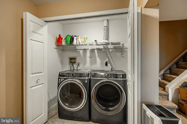 a bed room with a bed and a window