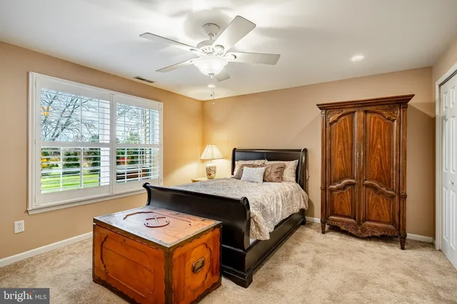 a view of a balcony with wooden floor and fence