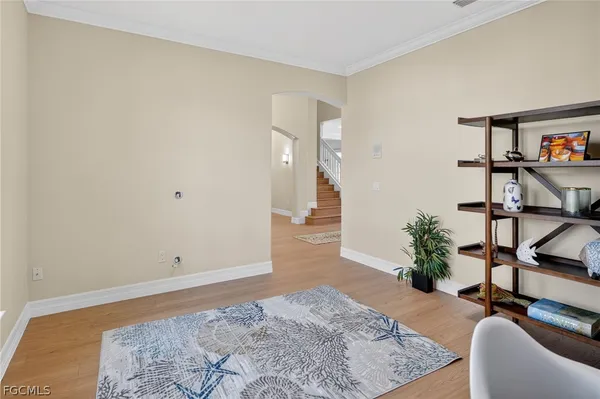 a view of a bedroom with furniture and rug