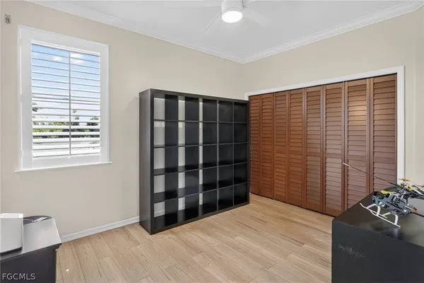 a view of an empty room with a window