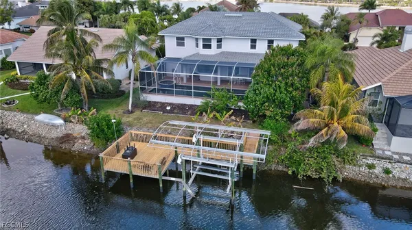 a view of multiple houses with outdoor space
