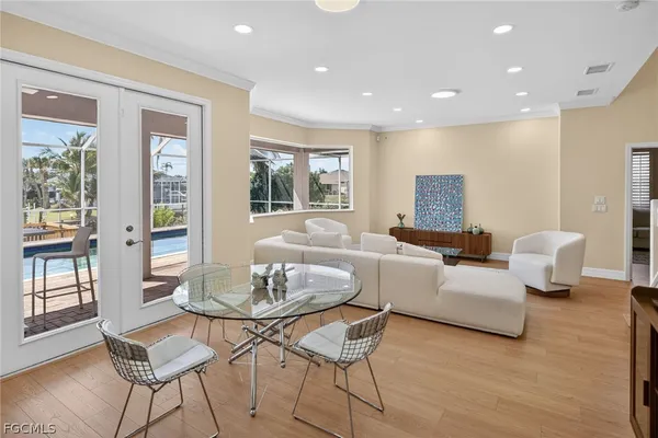 a living room with furniture and a table