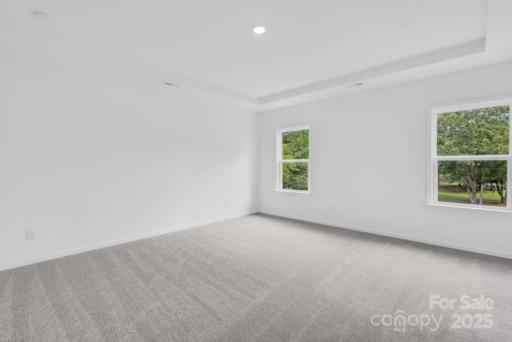 173 Glenn Drive Mooresville, NC 28115 - Photo 12 of 35 an empty room with windows
