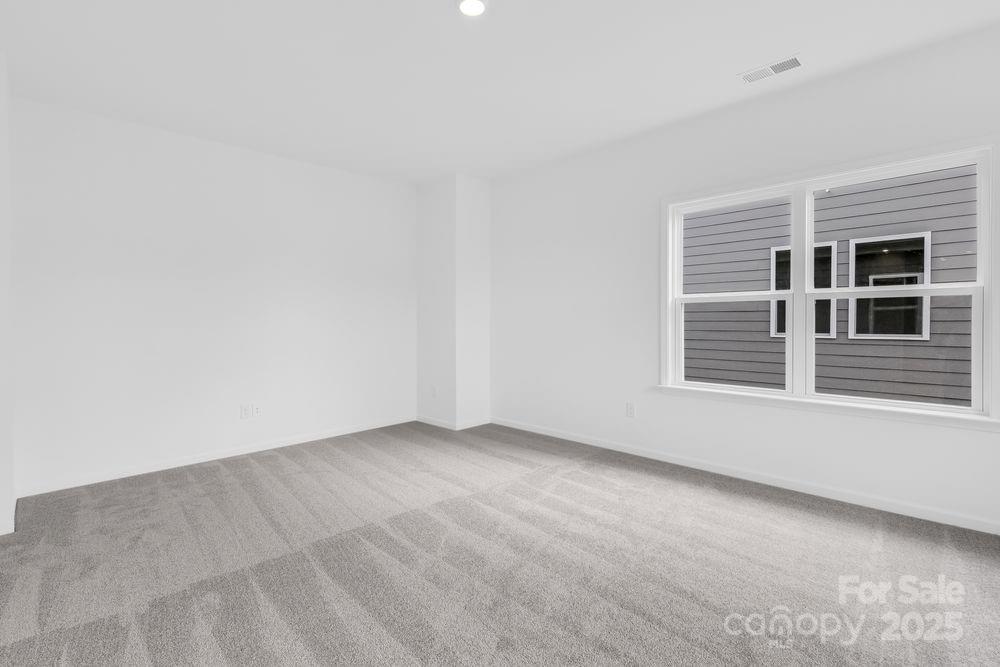 173 Glenn Drive Mooresville, NC 28115 - Photo 20 of 35 an empty room with a window