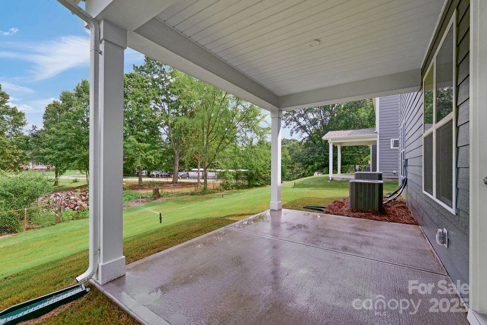 173 Glenn Drive Mooresville, NC 28115 - Photo 28 of 35 a view of a porch with a backyard