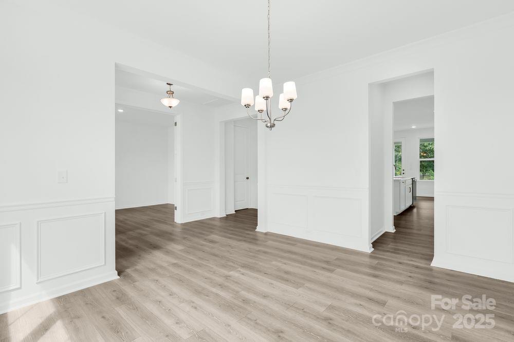 173 Glenn Drive Mooresville, NC 28115 - Photo 7 of 35 wooden floor in an empty room