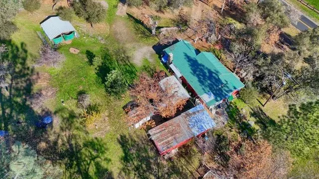 an aerial view of beach and swimming pool