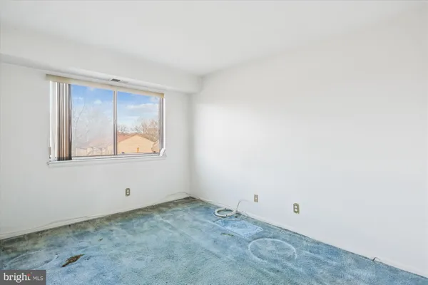 a view of an empty room with window