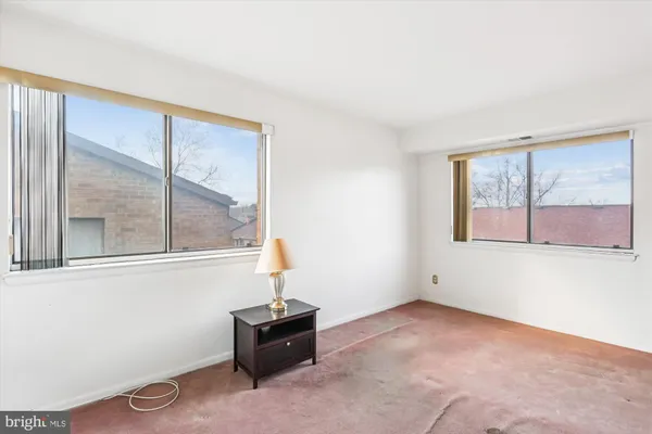 an empty room with windows