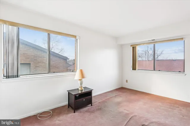 an empty room with windows