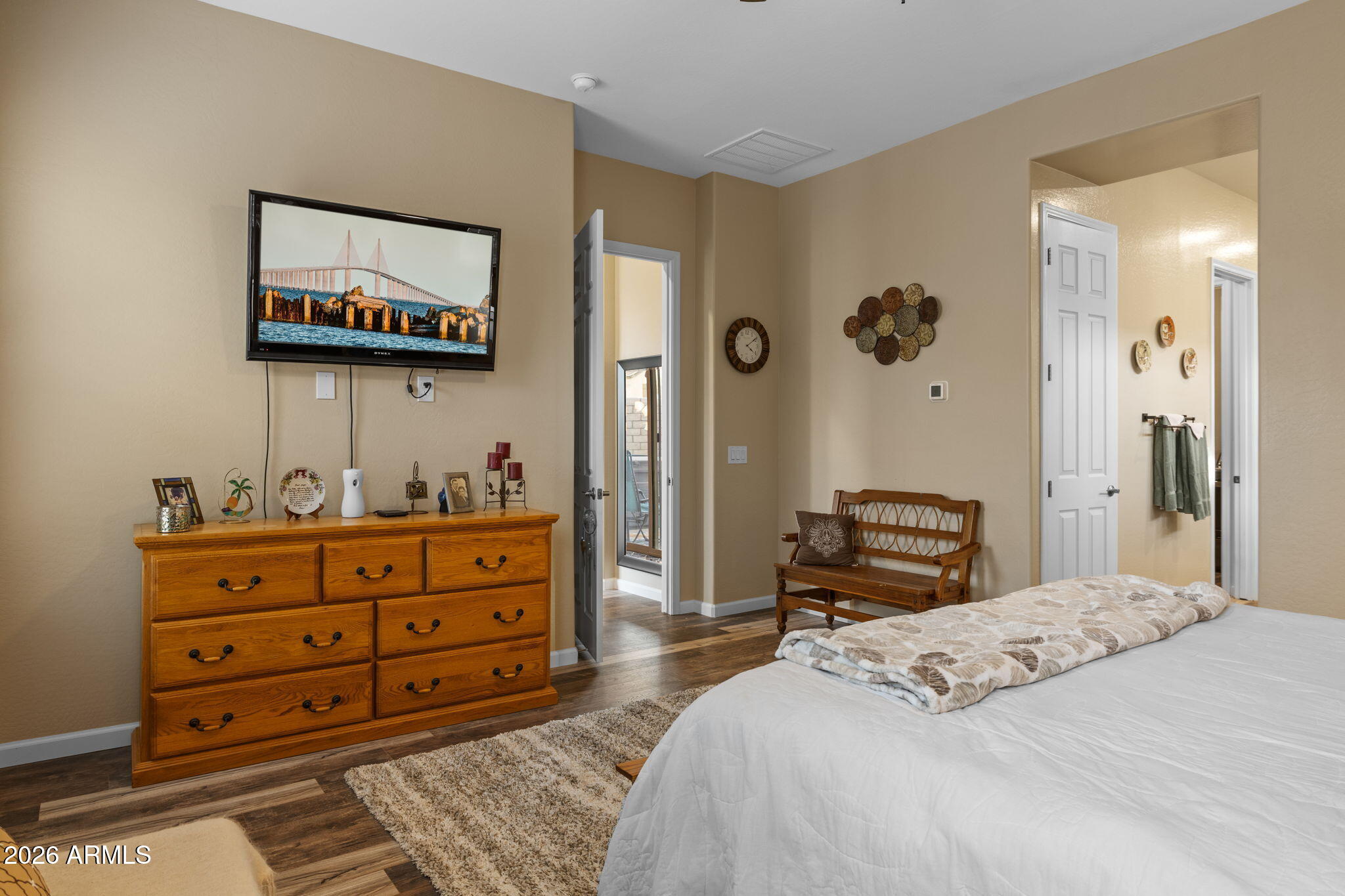18502 West Desert Trumpet Road Goodyear, AZ 85338 - Photo 21 of 41 a bedroom with a bed and a dresser in it