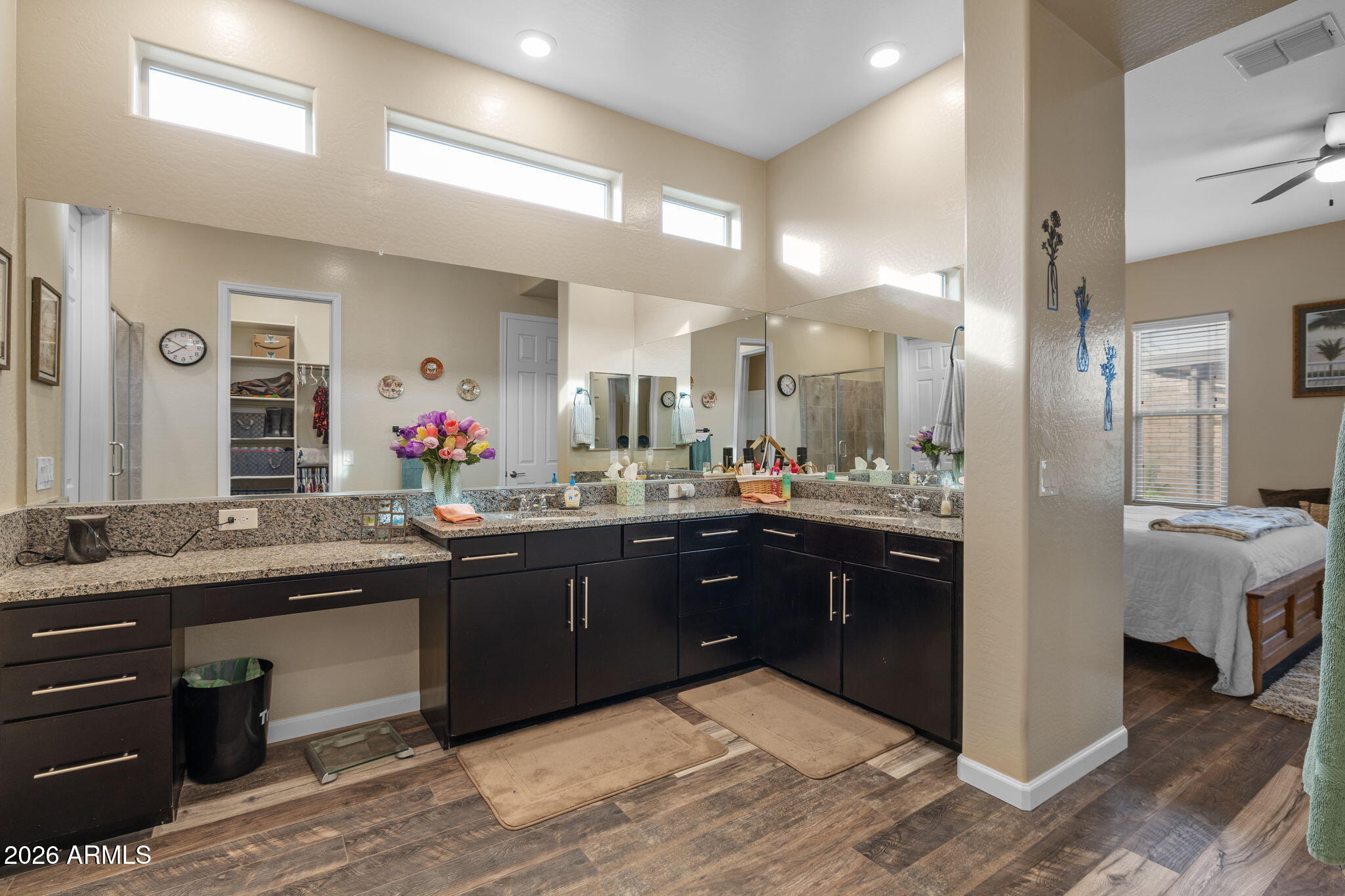 18502 West Desert Trumpet Road Goodyear, AZ 85338 - Photo 24 of 41 a large bathroom with a large tub and sink