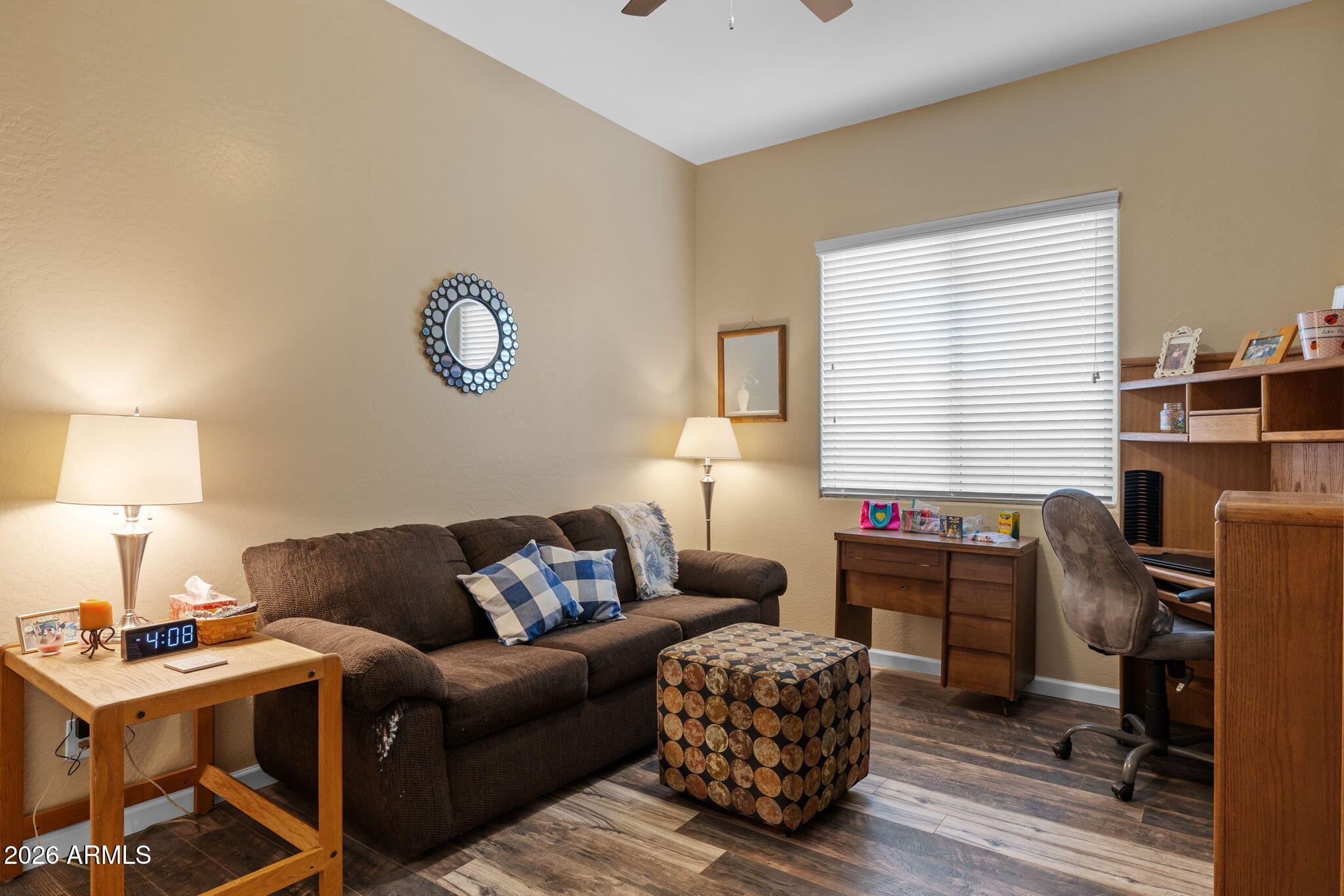 18502 West Desert Trumpet Road Goodyear, AZ 85338 - Photo 26 of 41 a work room with furniture lamp and a window