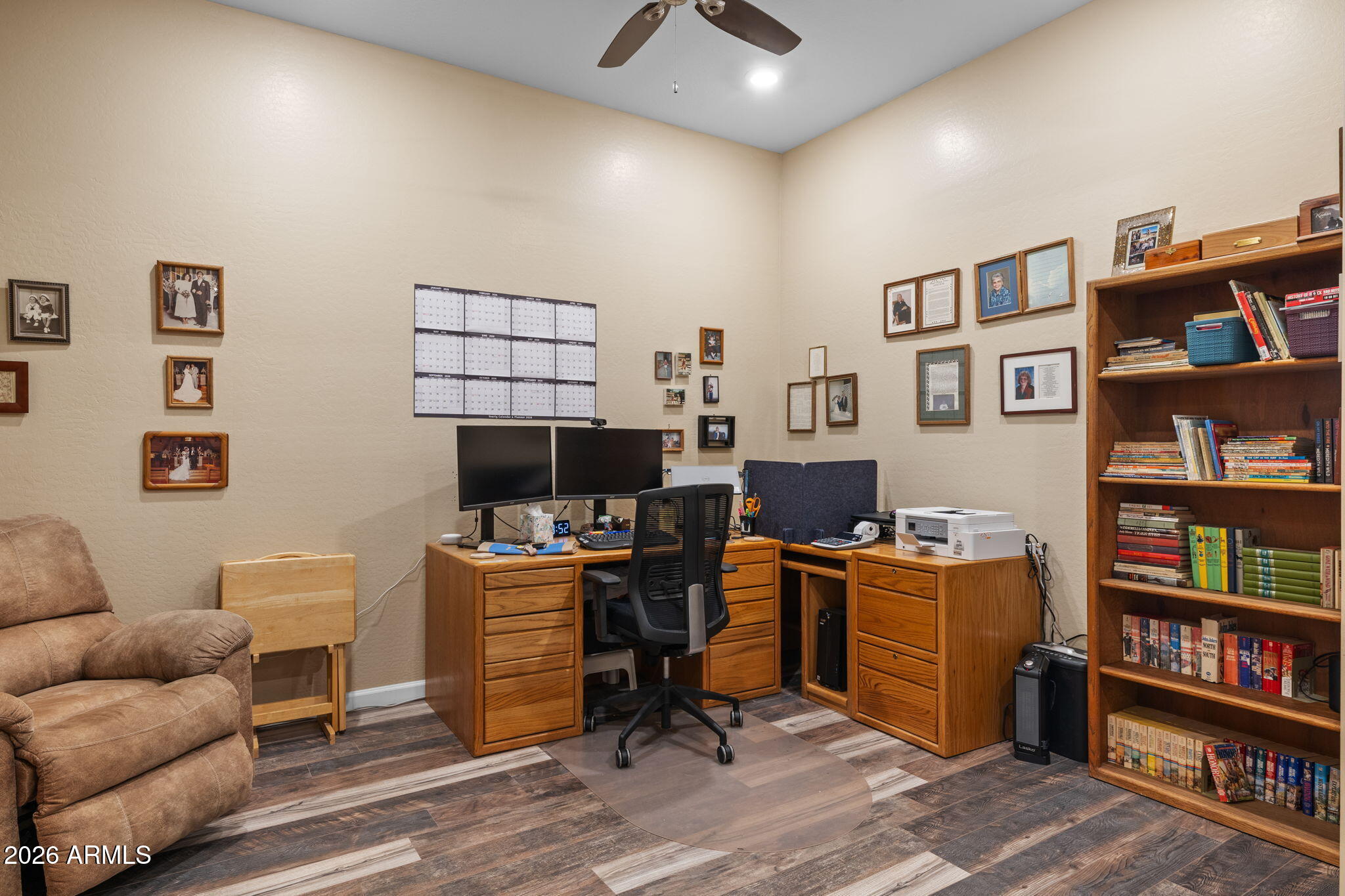 18502 West Desert Trumpet Road Goodyear, AZ 85338 - Photo 5 of 41 a view of a livingroom with workspace and a couch