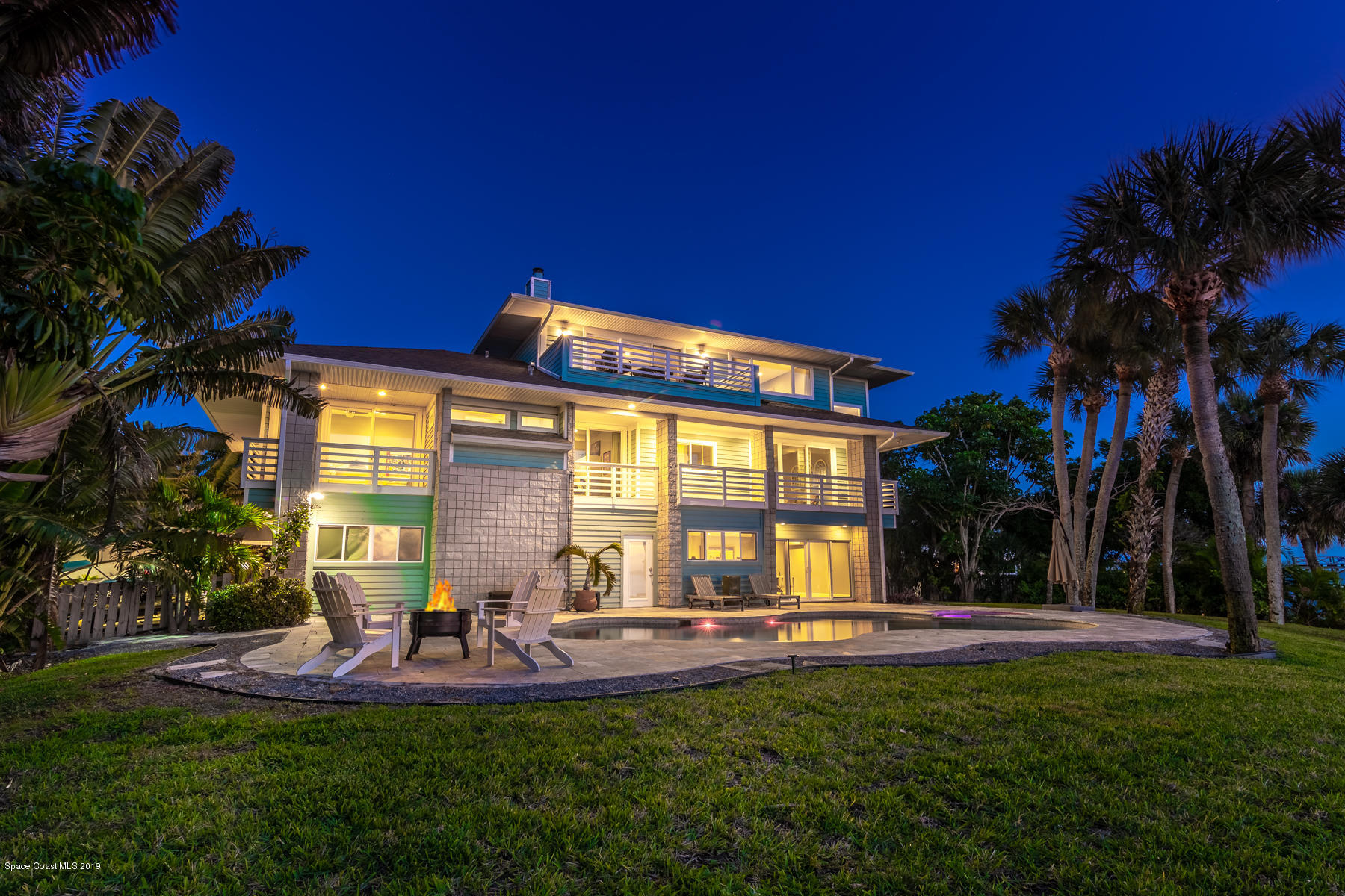 400 Richards Road Melbourne Beach, FL 32951 - Photo 1 of 59 a view of swimming pool with outdoor seating