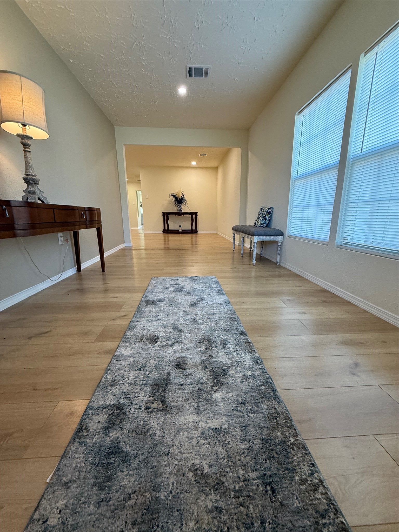 4546 Connorvale Road Houston, TX 77039 - Photo 2 of 25 a living room with furniture and a table