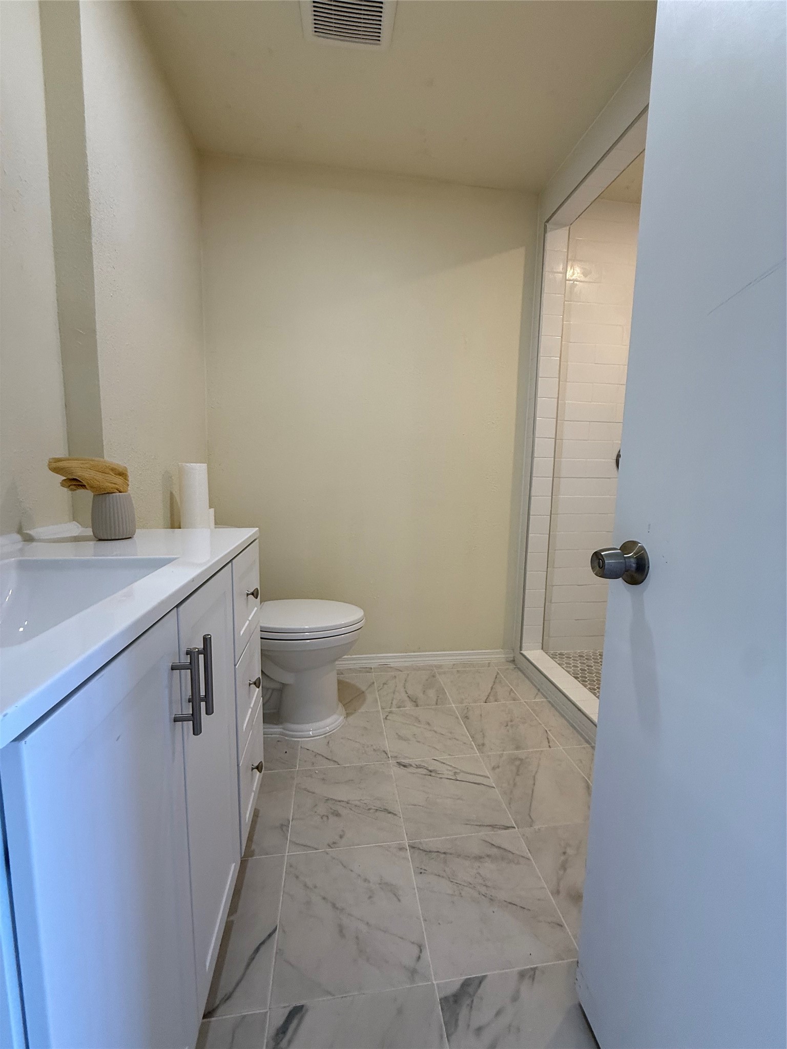 4546 Connorvale Road Houston, TX 77039 - Photo 22 of 25 a bathroom with a sink a toilet and a shower