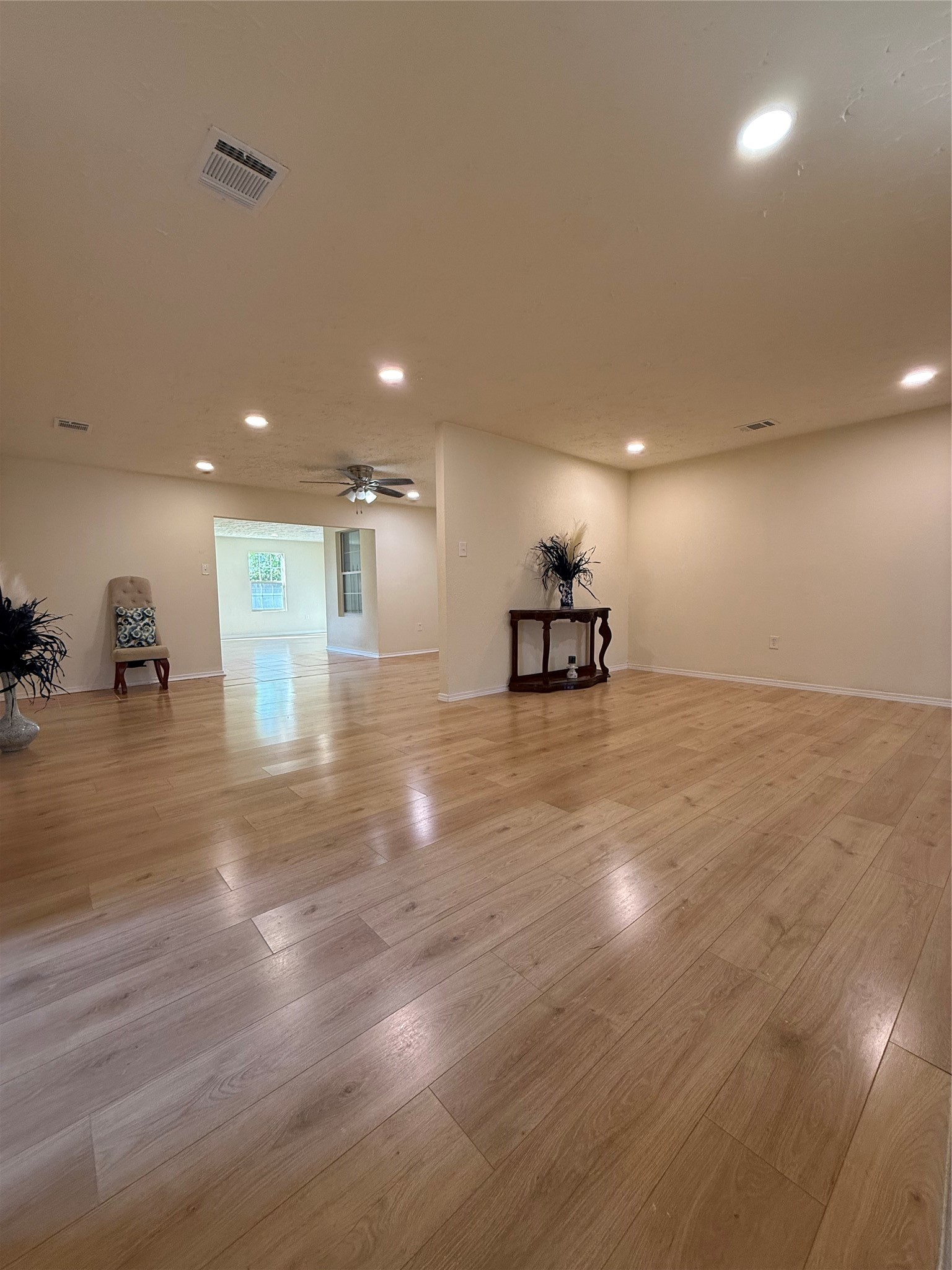 4546 Connorvale Road Houston, TX 77039 - Photo 3 of 25 a view of empty room with wooden floor
