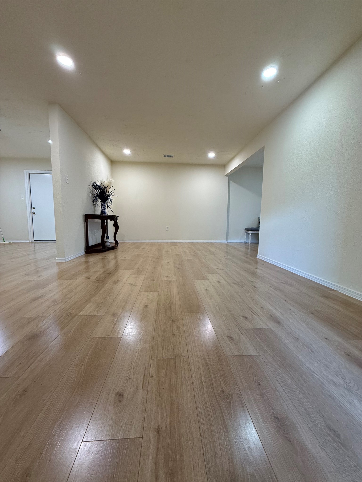 4546 Connorvale Road Houston, TX 77039 - Photo 4 of 25 a view of a room with wooden floor