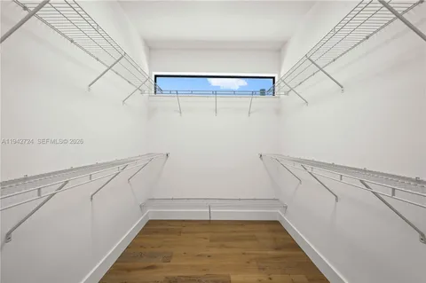 a view of a room with racks on the wall