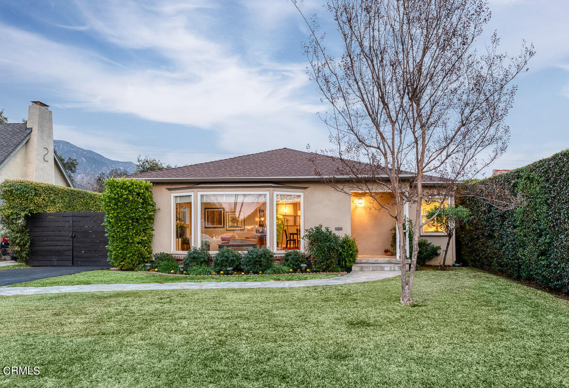 1404 Coolidge Avenue Pasadena, CA 91104 - Photo 1 of 33 a front view of a house with garden