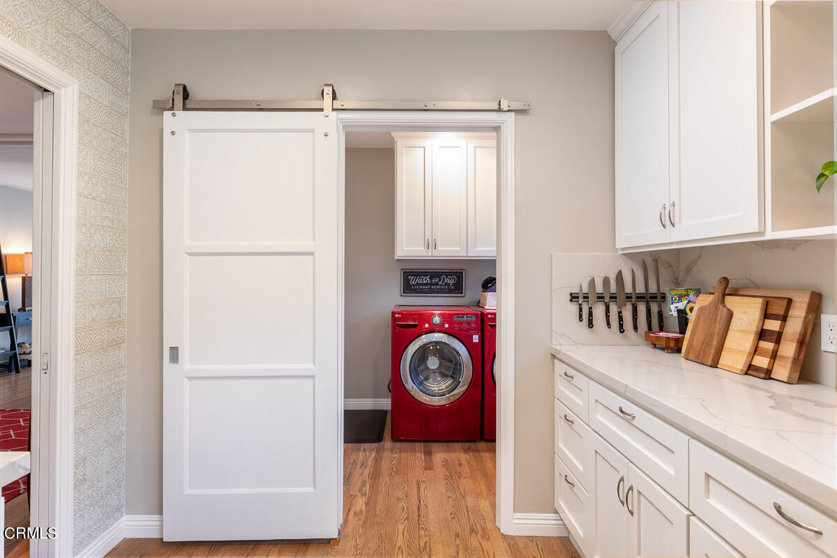 1404 Coolidge Avenue Pasadena, CA 91104 - Photo 15 of 33 a utility room with dryer and washer