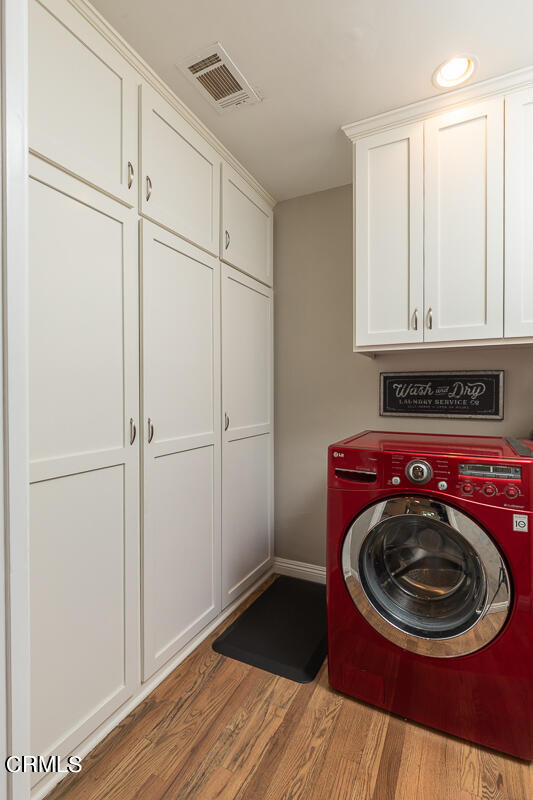 1404 Coolidge Avenue Pasadena, CA 91104 - Photo 16 of 33 a utility room with wooden floor washer and dryer