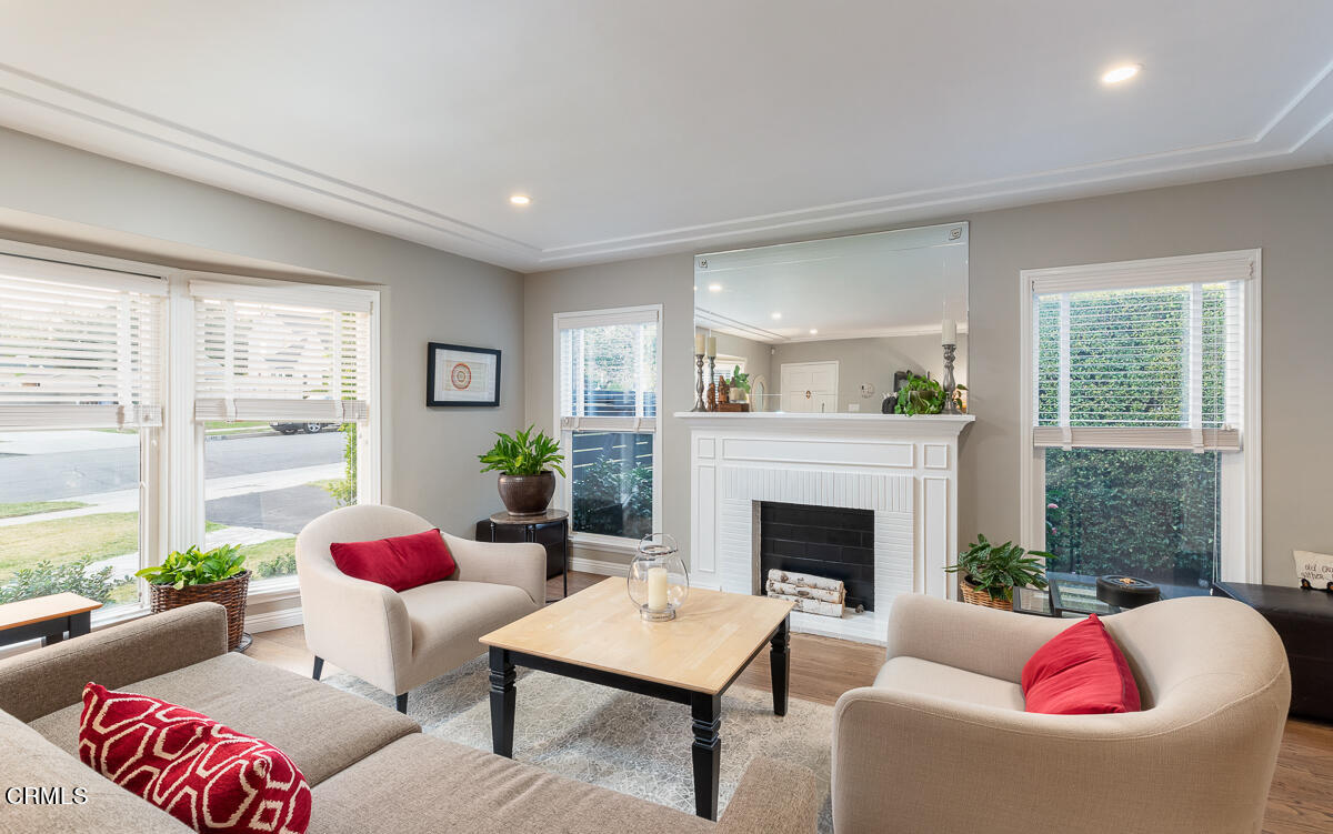 1404 Coolidge Avenue Pasadena, CA 91104 - Photo 4 of 33 a living room with furniture and a fireplace