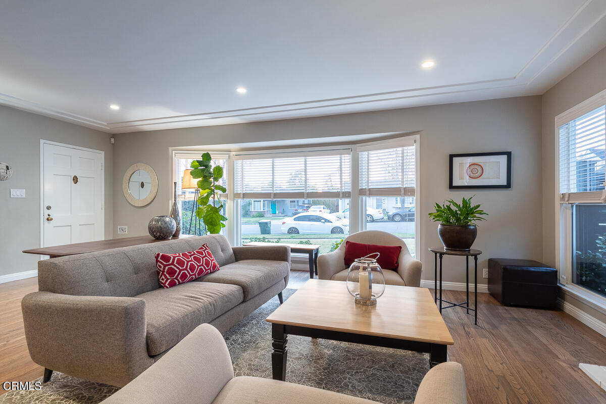1404 Coolidge Avenue Pasadena, CA 91104 - Photo 5 of 33 a living room with furniture potted plant and a window