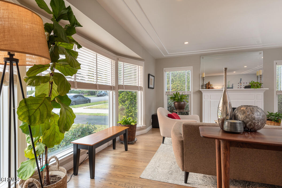 1404 Coolidge Avenue Pasadena, CA 91104 - Photo 6 of 33 a living room with furniture and a potted plant