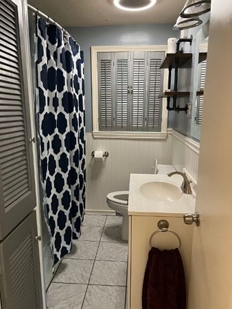 21 Don Court Pawtucket, RI 02861 - Photo 12 of 16 a bathroom with a sink and a toilet