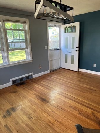 21 Don Court Pawtucket, RI 02861 - Photo 4 of 16 an empty room with windows