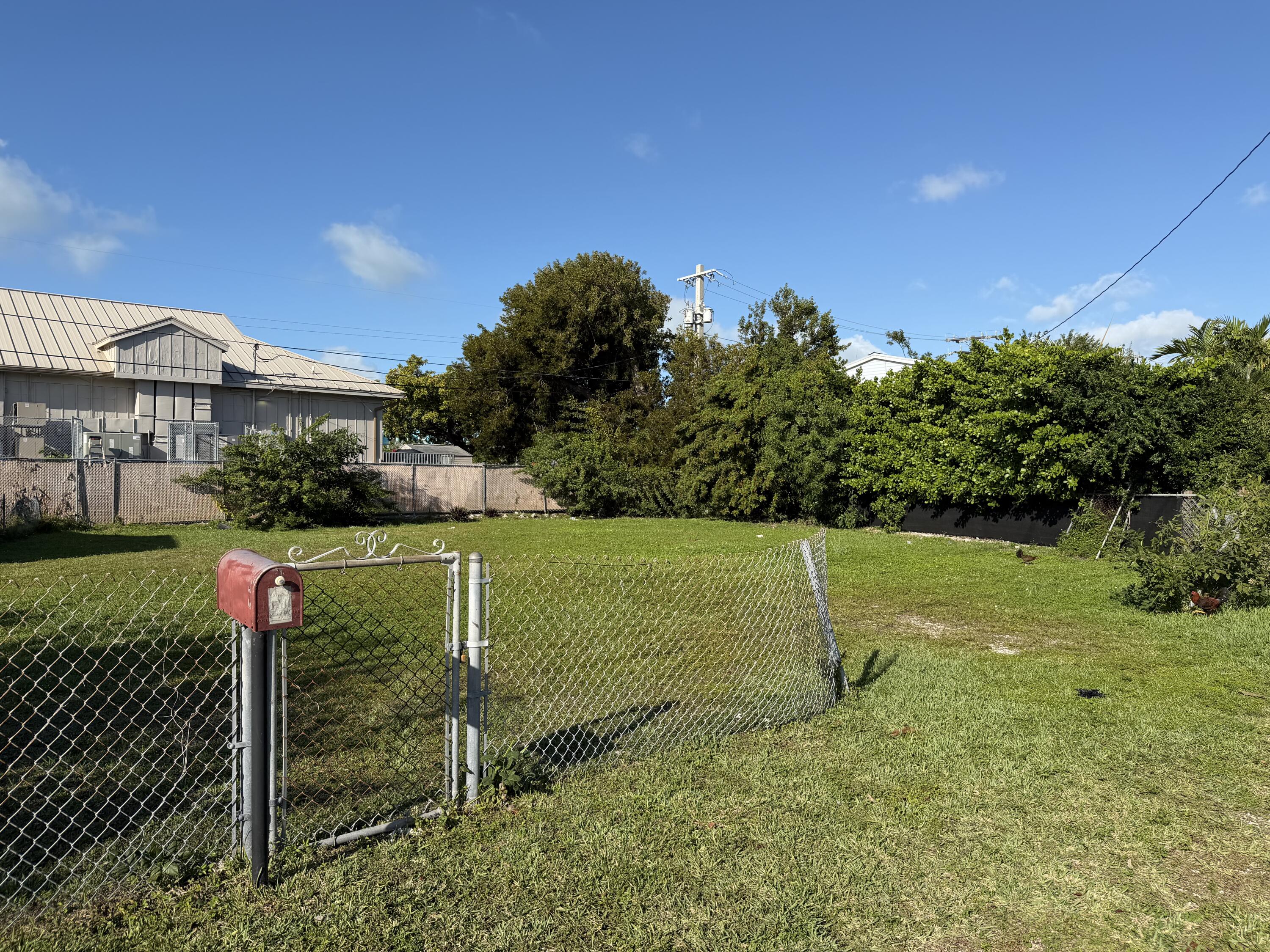 2 Dolphin Road Key West, FL 33040 - Photo 5 of 7 a view of a house with a yard