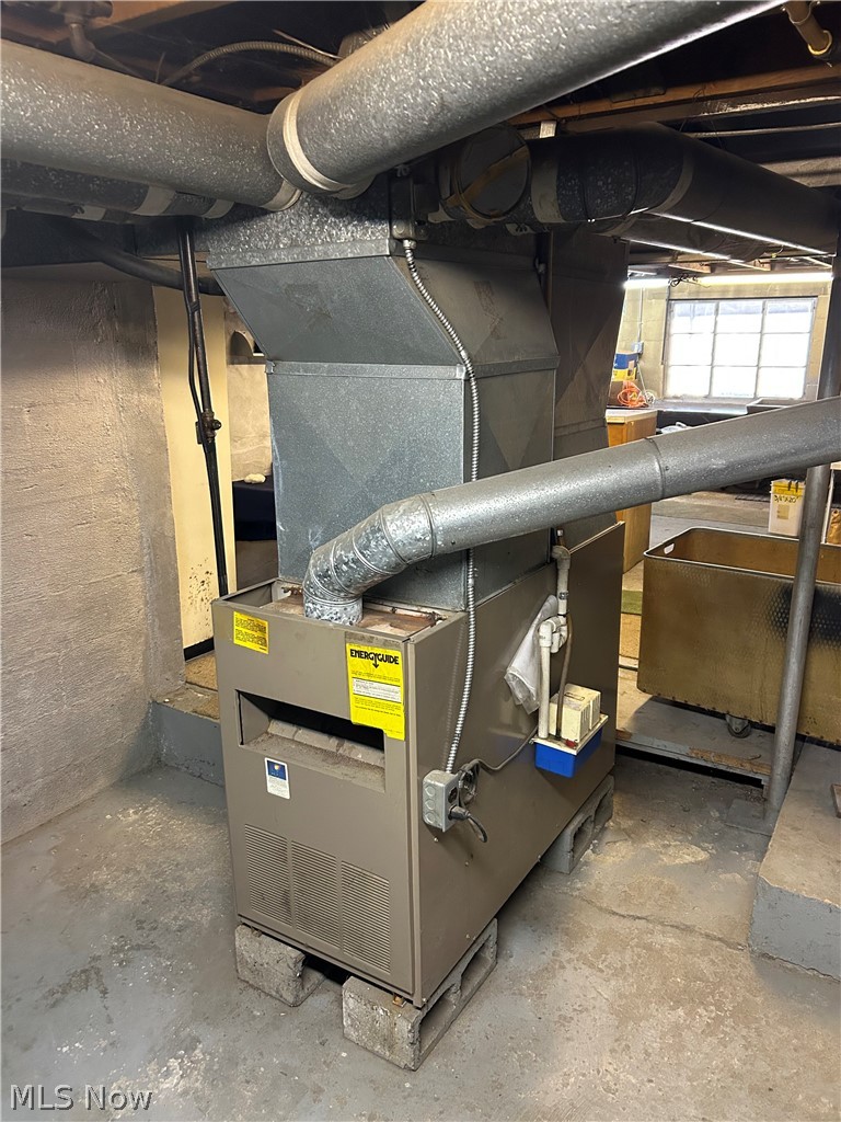 1283 Nesbitt Road Northfield, OH 44067 - Photo 11 of 22 Utility room featuring heating utilities